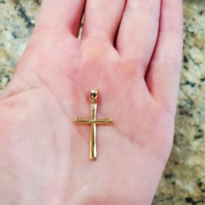 14K gold cross. Never worn.